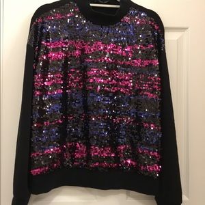 Dressy sweater with colorful rhinestones. Worn once for New Years.